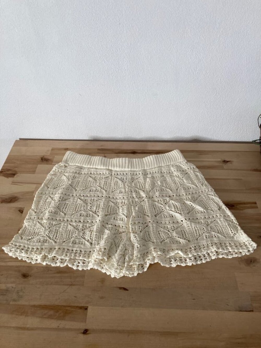 #0014 Off-white crochet shorts featuring an open-knit geometric pattern